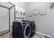 Laundry Room with new appliances and decor at 21266 S 213Th Pl, Queen Creek, AZ 85142