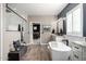 Bright main bathroom with double vanity, freestanding tub, and shower with seat at 21266 S 213Th Pl, Queen Creek, AZ 85142