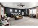 The main bedroom is complete with natural light, a sitting area, and plenty of closet space at 21266 S 213Th Pl, Queen Creek, AZ 85142