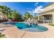 Beautiful pool with sun shelf and well-maintained landscaping, ideal for outdoor entertaining at 21266 S 213Th Pl, Queen Creek, AZ 85142