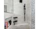 Updated shower with tile surround, rain shower head, and built-in bench and shelf at 21266 S 213Th Pl, Queen Creek, AZ 85142