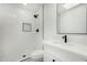 Modern bathroom featuring a walk-in shower with black trim at 220 N 22Nd Pl # 2041, Mesa, AZ 85213