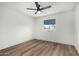 Bright bedroom with ceiling fan and view of the backyard at 220 N 22Nd Pl # 2041, Mesa, AZ 85213