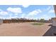 Large gravel backyard featuring a young shade tree and fenced perimeter at 2234 W Mohawk Ln, Phoenix, AZ 85027