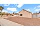 Single-story home with desert landscaping, a two-car garage, and a sidewalk at 2234 W Mohawk Ln, Phoenix, AZ 85027