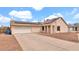 Charming single-story home with desert landscaping and a two-car garage at 2234 W Mohawk Ln, Phoenix, AZ 85027