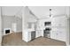 Bright kitchen featuring white cabinets, stainless steel appliances, and an open floorplan at 2234 W Mohawk Ln, Phoenix, AZ 85027