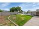 Large backyard with grass and a private pool, perfect for outdoor entertaining at 2262 E Javelina Ave, Mesa, AZ 85204