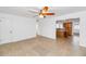 Open concept living space with tile flooring adjacent to the kitchen at 2262 E Javelina Ave, Mesa, AZ 85204