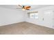 Bright living room with tile flooring and a ceiling fan at 2262 E Javelina Ave, Mesa, AZ 85204