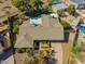 Aerial view of a single-Gathering home featuring a fenced pool and lush landscaping at 2433 E Acoma Dr, Phoenix, AZ 85032