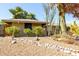 A charming one story house with desert landscaping at 2433 E Acoma Dr, Phoenix, AZ 85032