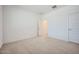 Neutral carpeted bedroom featuring bright white walls at 25188 N 174Th Ave, Surprise, AZ 85387