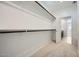 Spacious walk-in closet featuring carpet and shelving at 25188 N 174Th Ave, Surprise, AZ 85387