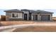A charming single-Gathering home with a two-car garage and tasteful accents at 27046 W Rockwood Dr, Buckeye, AZ 85396