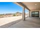 Covered patio offers shade and stunning desert scenery at 27046 W Rockwood Dr, Buckeye, AZ 85396
