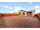 Large, sunny backyard with clear skies providing an open space for relaxation, recreation, and outdoor activities at 27110 W Adam Ave, Buckeye, AZ 85396