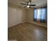 Bright bedroom featuring a large closet, ceiling fan, and lots of light at 2729 E Carol Ave, Mesa, AZ 85204