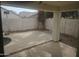Covered patio area, with a view of the backyard and privacy wall at 2729 E Carol Ave, Mesa, AZ 85204