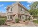 Charming two-story townhome with well-maintained landscaping and desert-style rock ground cover at 2834 S Extension Rd # 1079, Mesa, AZ 85210