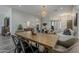 Elegant dining area with modern lighting and furniture, seamlessly connected to the living spaces at 3662 E Megan St, Gilbert, AZ 85295