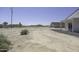 Large backyard with gravel and desert landscaping, providing ample space for relaxation and recreation at 3725 N Bandelier Dr, Eloy, AZ 85131