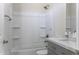 A bathroom features a shower-tub combo, gray vanity and a white countertop at 3725 N Bandelier Dr, Eloy, AZ 85131