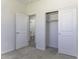 View of bedroom with a sliding-door closet; the en-suite bathroom is visible through the open door at 3725 N Bandelier Dr, Eloy, AZ 85131