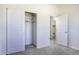 A bedroom featuring carpet flooring, closet with sliding doors and a door to another room at 3725 N Bandelier Dr, Eloy, AZ 85131