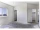 This bedroom provides natural light from the window, neutral walls, and entry to a closet at 3725 N Bandelier Dr, Eloy, AZ 85131