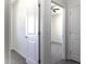 A hallway leads into a carpeted bedroom that has a ceiling fan at 3725 N Bandelier Dr, Eloy, AZ 85131