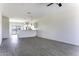Spacious living room featuring recessed lighting and stylish tile flooring at 3725 N Bandelier Dr, Eloy, AZ 85131
