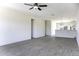 Open-concept living room featuring a ceiling fan and tile flooring at 3725 N Bandelier Dr, Eloy, AZ 85131