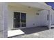 Covered patio features a sliding glass door leading to the home's interior and a concrete slab at 3725 N Bandelier Dr, Eloy, AZ 85131