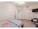 Simple bedroom with a ceiling fan and closet, showcasing a blank canvas for personalization at 3781 N 161St Dr, Goodyear, AZ 85395