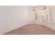 Bright bedroom with neutral carpet, shuttered windows and decorator treatments at 3781 N 161St Dr, Goodyear, AZ 85395