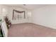 Large bedroom with neutral carpet, dual shuttered windows and decorator treatments at 3781 N 161St Dr, Goodyear, AZ 85395