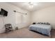 The primary bedroom is a cozy space, with ceiling fan and window, perfect for relaxation at 3781 N 161St Dr, Goodyear, AZ 85395