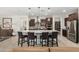 Modern kitchen boasts a large island with bar seating, stainless steel appliances, and a walk-in pantry at 3945 E Cherry Hills Dr, Chandler, AZ 85249