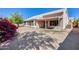 Home's backyard featuring a covered patio, desert landscaping and privacy fencing at 4001 E Rosemonte Dr, Phoenix, AZ 85050