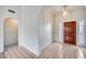 Foyer with tile flooring, archway, and a decorative front door with sidelights at 4001 E Rosemonte Dr, Phoenix, AZ 85050