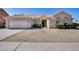 Charming single-story home with low maintenance front yard and attached two car garage at 4001 E Rosemonte Dr, Phoenix, AZ 85050
