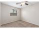 Neutral bedroom with plush carpet and window at 4094 E Los Altos Dr, Gilbert, AZ 85297