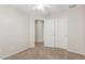 Bedroom with plush carpet and access to closet at 4094 E Los Altos Dr, Gilbert, AZ 85297