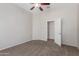 Bedroom with neutral walls, plush carpet, and a ceiling fan at 4094 E Los Altos Dr, Gilbert, AZ 85297