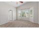 Main bedroom with large windows, ensuite bathroom, and neutral decor at 4094 E Los Altos Dr, Gilbert, AZ 85297