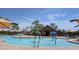 Fun splash pad featuring whimsical fountains, shelters, and seating area at 4094 E Los Altos Dr, Gilbert, AZ 85297