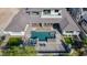 Aerial view of a luxury home highlighting the private pool, patios, and desert-style landscaping at 4098 N Golf Dr, Buckeye, AZ 85396