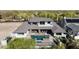 Aerial view of the home displaying the pool and outdoor living space with desert landscaping at 4098 N Golf Dr, Buckeye, AZ 85396