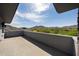 Outdoor balcony offering views of the desert landscape and distant mountains at 4098 N Golf Dr, Buckeye, AZ 85396